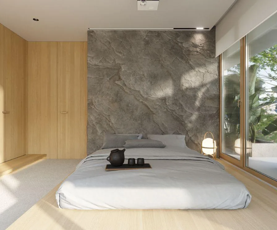 Minimal bedroom with stone feature wall
